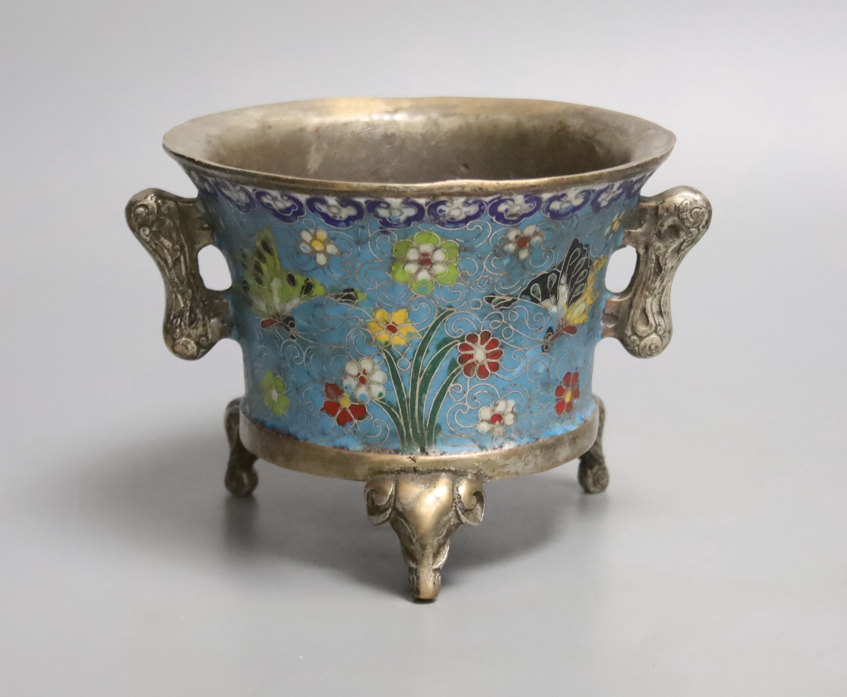 A heavy Chinese silvered bronze twin handled censer with floral decoration, a four character Xuande mark, diameter 14cm 12cm high